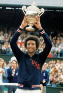Arthur Ashe with trophy